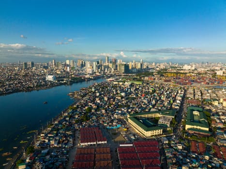 Top view of panorama of the city of Manila with skyscrapers and the port area.