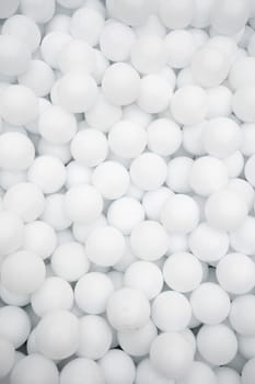 Many white plastic balls for dry pool in amusement park