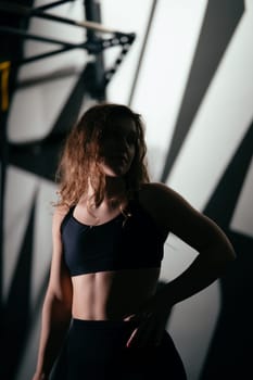 Athletic Beautiful Woman Does Her Cross Fitness, Bodybuilding Gym Training Routine