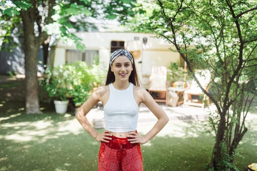 Happy hippie girl are having a good time in a camper trailer. Holiday, vacation, trip concept.High quality photo