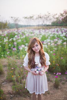 Happy girl relaxing on meadow