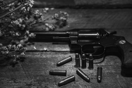 handgun bullets on wood table