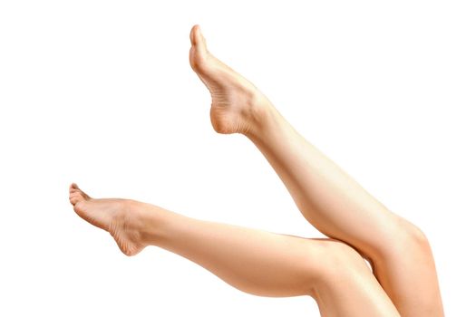 Beautiful female legs and on white background isolation
