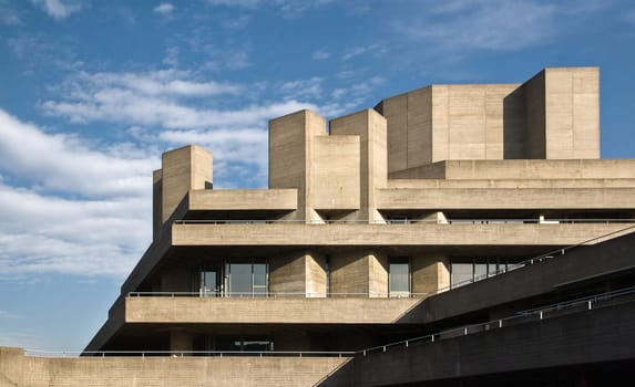 London, United Kingdom - February 17, 2007: Royal National theatre (designed by Sir Denys Lasdun) as seen from Waterloo Bridge. Example of Brutalist architecture movement in UK capital.