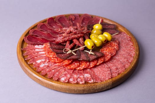 meat sliced from delicacies on a wooden stand.