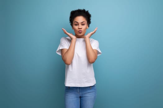 young latin woman dressed in white t-shirt with print mockup.