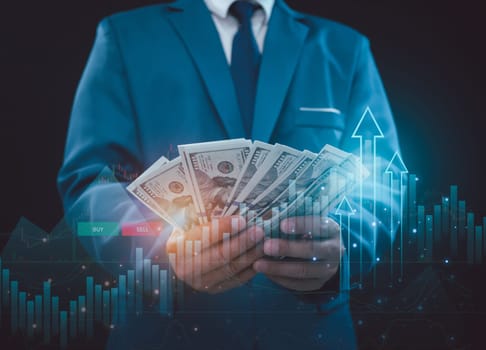 investment and finance concept, businessman holding money, stock market, profits and business growth
