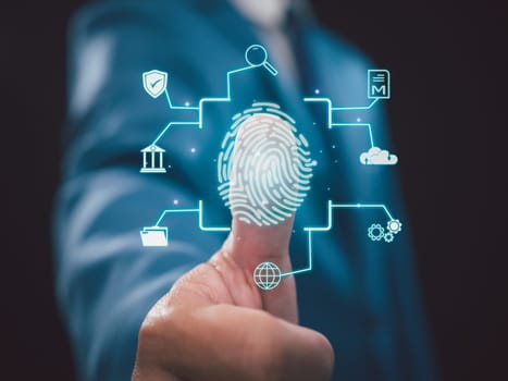 Businessman scan fingerprint biometric identity and approval. Secure access granted by valid fingerprint scan, Business Technology Safety Internet Network Concept, Business Technology Safety Internet Network Concept.