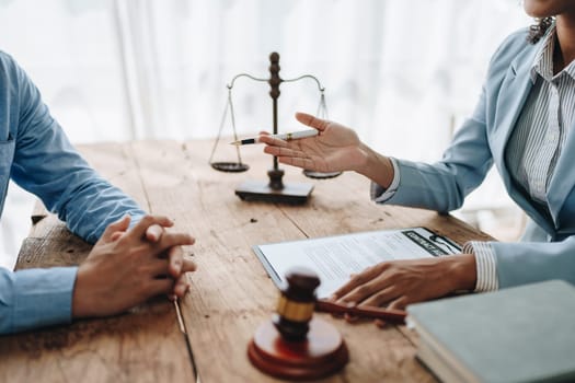 african american attorney, lawyers discussing contract or business agreement at law firm office, Business people making deal document legal, justice advice service concepts.