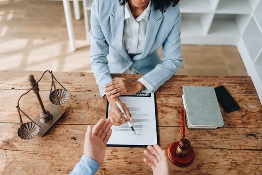 african american attorney, lawyers discussing contract or business agreement at law firm office, Business people making deal document legal, justice advice service concepts.