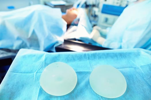 Man surgeon at work in operating room.