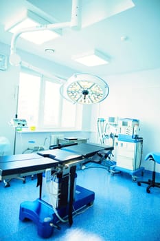 Interior of operating room in modern clinic.