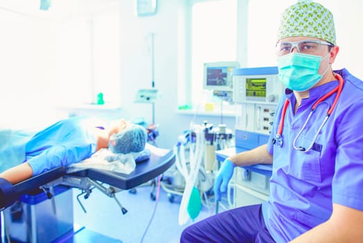 Male surgeon on background in operation room.