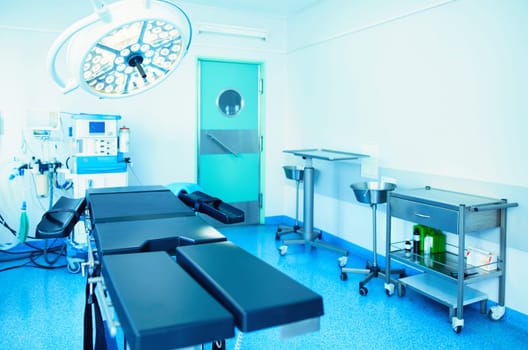 Interior of operating room in modern clinic.