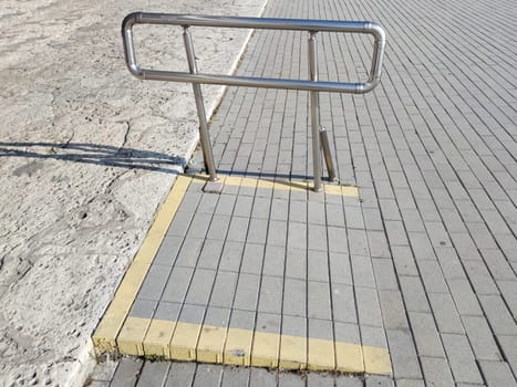 low ramp with handrails for people with disabilities close-up