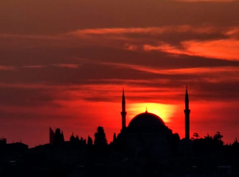 Mosque in Istanbul against the backdrop of the sunset sky.