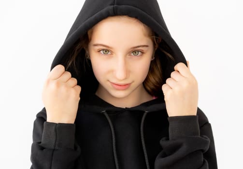 Portrait of cute girl in black hood isolated on white background