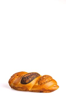 delicious fresh loaf with poppy seeds on a white background.