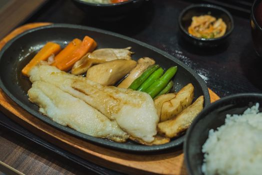 fish steak with vegetables