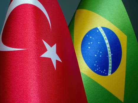 Flags of Turkey and Brazil side by side.