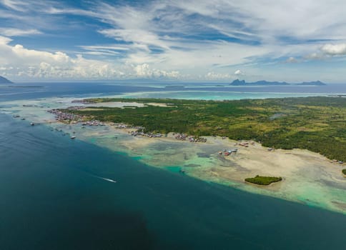 Aerial view of island Bum Bum with towns and villages. Semporna, Sabah, Malaysia.