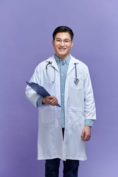 Asian male doctor portrait on purple background
