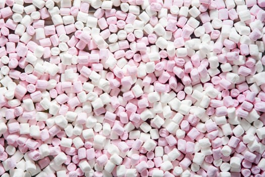 Pink and white mini puffy marshmallows background, closeup texture, Bunch of various mini puffy marshmallows, Top view, High Quality Photo