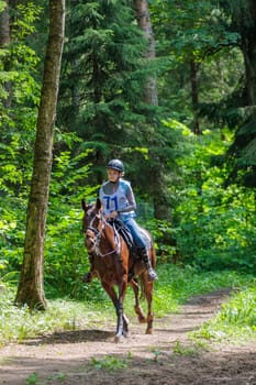 A rider rides a horse in a competition. Moscow Russia July 1, 2023. High quality photo