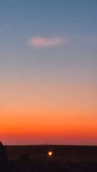 evening sunset over a dark chink, landscape, red-blue sky. High quality photo