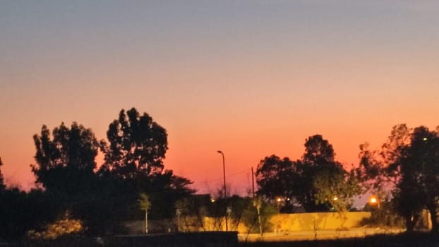evening sunset over a dark chink, landscape, red-blue sky. High quality photo