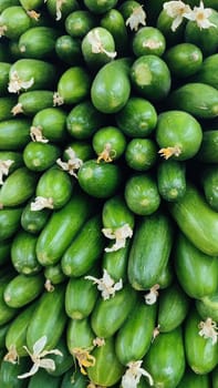 green cucumbers fresh vegetables lie in the grocery store, fresh food, vegetarianism. High quality photo