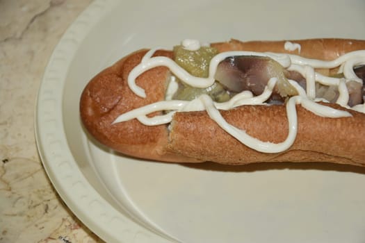 white bun with fish and mayonnaise. High quality photo