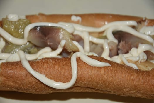 white bun with fish and mayonnaise. High quality photo
