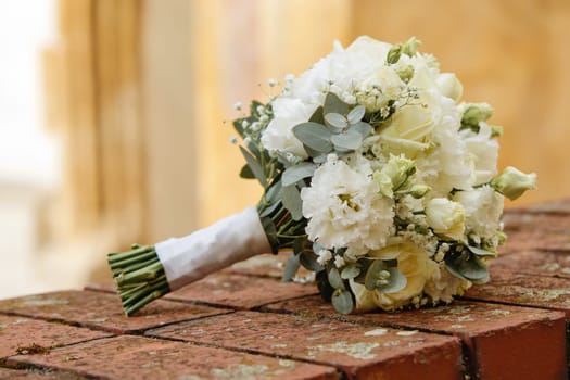 Bride's bouquet of fresh flowers. Close-up. Soft focus.