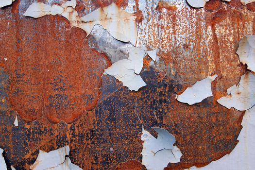 Rusty iron surface with peeling paint - grunge texture