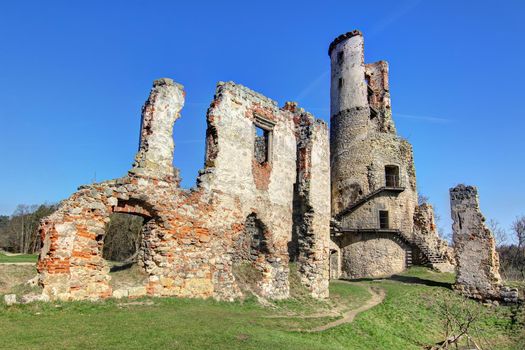 Ruins of Zviretice castle. Zviretice castle is extensive ruins of a castle from the 14th century, rebuilt into a Renaissance castle above the village Podhradi about 2 km southwest of Bakov nad Jizerou. Since 1958 the ruins are protected as a cultural monument of the Czech Republic.