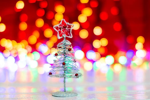 Christmas ornaments against blurred light