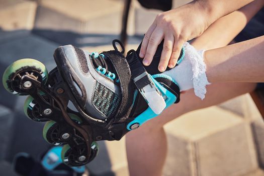 Roller skates and shoes. Childhood, activity.Selective focus