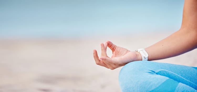 Woman, hands and yoga on beach for meditation, spiritual wellness or outdoor zen workout in fitness. Closeup of calm female person in relax on ocean coast for mindfulness or inner peace on mockup.