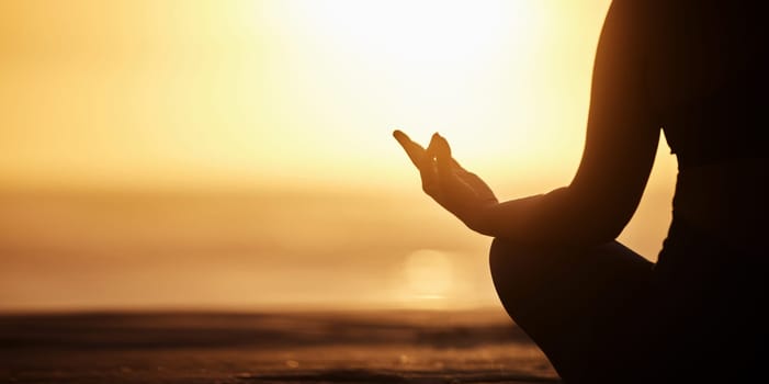 Silhouette, mockup and person doing meditation at the beach for wellness, health and zen or spiritual in morning sunrise. Balance, shadow and athlete meditate or yoga to be calm, workout and healthy.