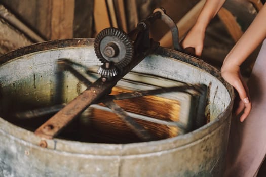 The process of extracting honey from bee honeycombs download photo