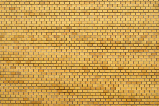 Texture of yellow brick wall. Background, texture.