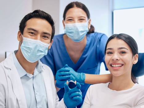 Portrait of dentist and woman with retainer for teeth whitening, service and dental care. Healthcare, dentistry and orthodontist with dentures for patient for oral hygiene, wellness and consulting.
