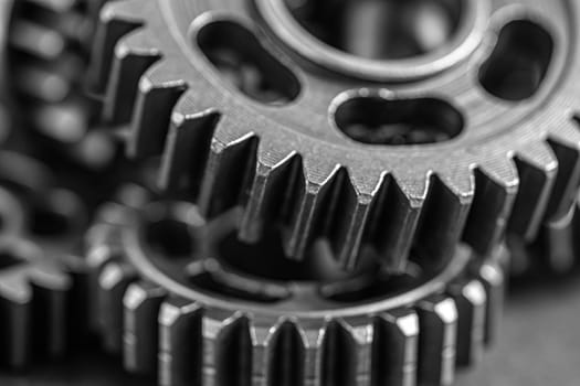 Gear and cogs wheels, clock mechanism, brass metal engine industrial.