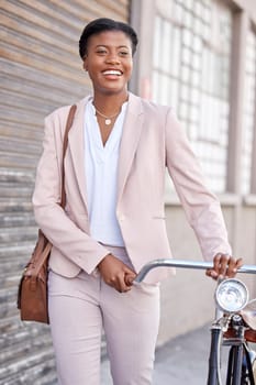 Business woman in city with bicycle, smile and sustainable morning commute walking on sidewalk. Eco friendly transport bike, cycling and happy African girl with urban transportation on work travel
