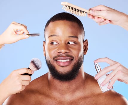 Self care, hands and man with beauty products in a studio for natural, face and grooming routine. Skincare, wellness and young male model with health and hygiene treatment isolated by blue background.