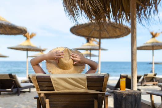 young beautiful woman enjoying summer vacation, beach relax, summer in tropics. High quality photo