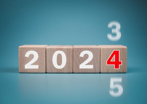 Wooden blocks lined up with the letters 2024. Represents the goal setting for 2024, the concept of a start. financial planning development strategy business goal setting.