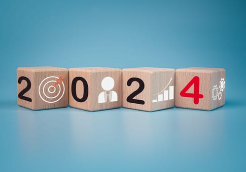 Wooden blocks lined up with the letters 2024. Represents the goal setting for 2024, the concept of a start. financial planning development strategy business goal setting