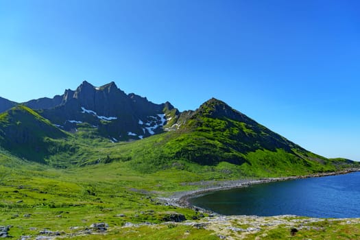 Amazing nature view with fjord and mountains. Beautiful summer Norway landscape. Artistic picture. Beauty world. The feeling of complete freedom